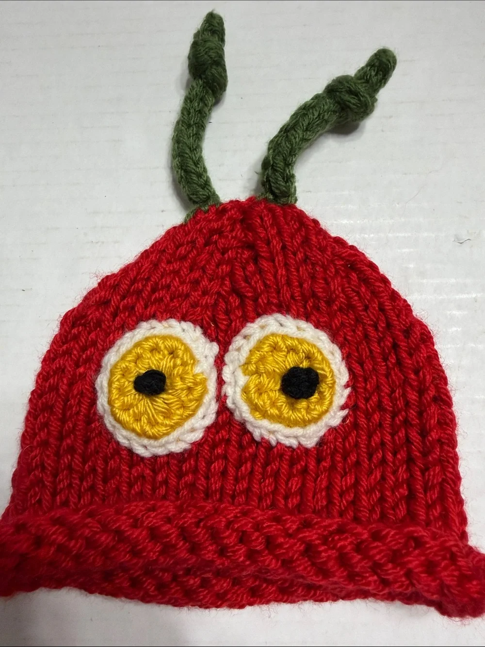 Red Knit Kids Beanie with Yellow Eye Detail and Green Antennae